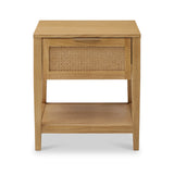 A wooden side table featuring a cane-front drawer and a lower shelf, isolated against a white background.