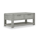 A wooden coffee table with two drawers and a lower shelf, in a light gray finish, isolated against a white background.