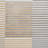 Horizontal stripes in various shades of brown and gray on a textured surface create an abstract pattern with a fabric-like appearance.