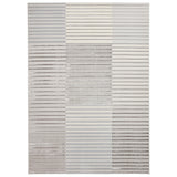 A textured rug with horizontal stripes in varying shades of gray and white creating a modern, simplistic design.