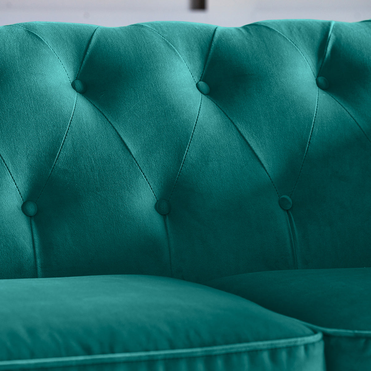 Kingswell-velvet-2-seater-sofa-teal from Roseland Furniture