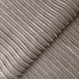 Corduroy fabric with pronounced ridges intersects at a diagonal, displaying the texture and pattern of the material in a monochromatic color scheme.