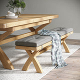 Portland Oak 200cm Cross Legged Dining Bench with beige cushion