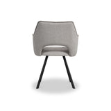 A modern chair with a curved gray fabric backrest and seat, supported by four angled black metal legs, stands isolated against a white background.