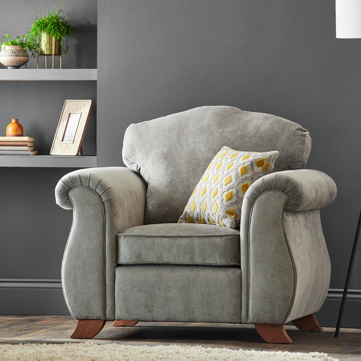 Ashwood-armchair-ochre-orange-cushions-grey from Roseland Furniture