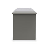 A simple grey box with a lighter grey, flat lid on top, centered on a plain white background.