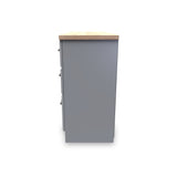 A tall, freestanding gray locker with a wooden top stands isolated against a blank, white background.