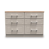 A wooden countertop rests on a grey six-drawer cabinet, isolated against a white background.