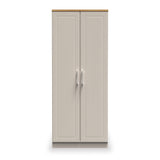 A beige double-door wardrobe with sleek handles stands closed against a plain background.