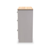 A tall, narrow grey cabinet with a light wooden top and silver handles, stands isolated against a white background.