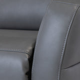 A close-up of a grey leather sofa with visible stitching, showing the texture and design details.