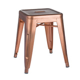 A metallic copper-colored stool stands isolated, with a square seat and angled legs, against a white background.