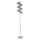 A modern floor lamp with multiple spherical, chrome-finished shades arranged in a vertical cluster on a slender pole, standing on a round base.