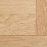 Light wooden planks intersect at right angles, creating a corner on a seamless wood floor.