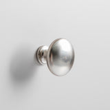 Round silver metal handle on the Farrow Grey Tallboy Chest of Drawers