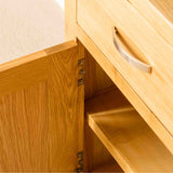 Metal handles on a London Oak Small Sideboard.