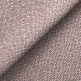 Textured fabric draped and folded diagonally, creating a shadow at the fold. The context is a close-up view, emphasizing the weave and texture.