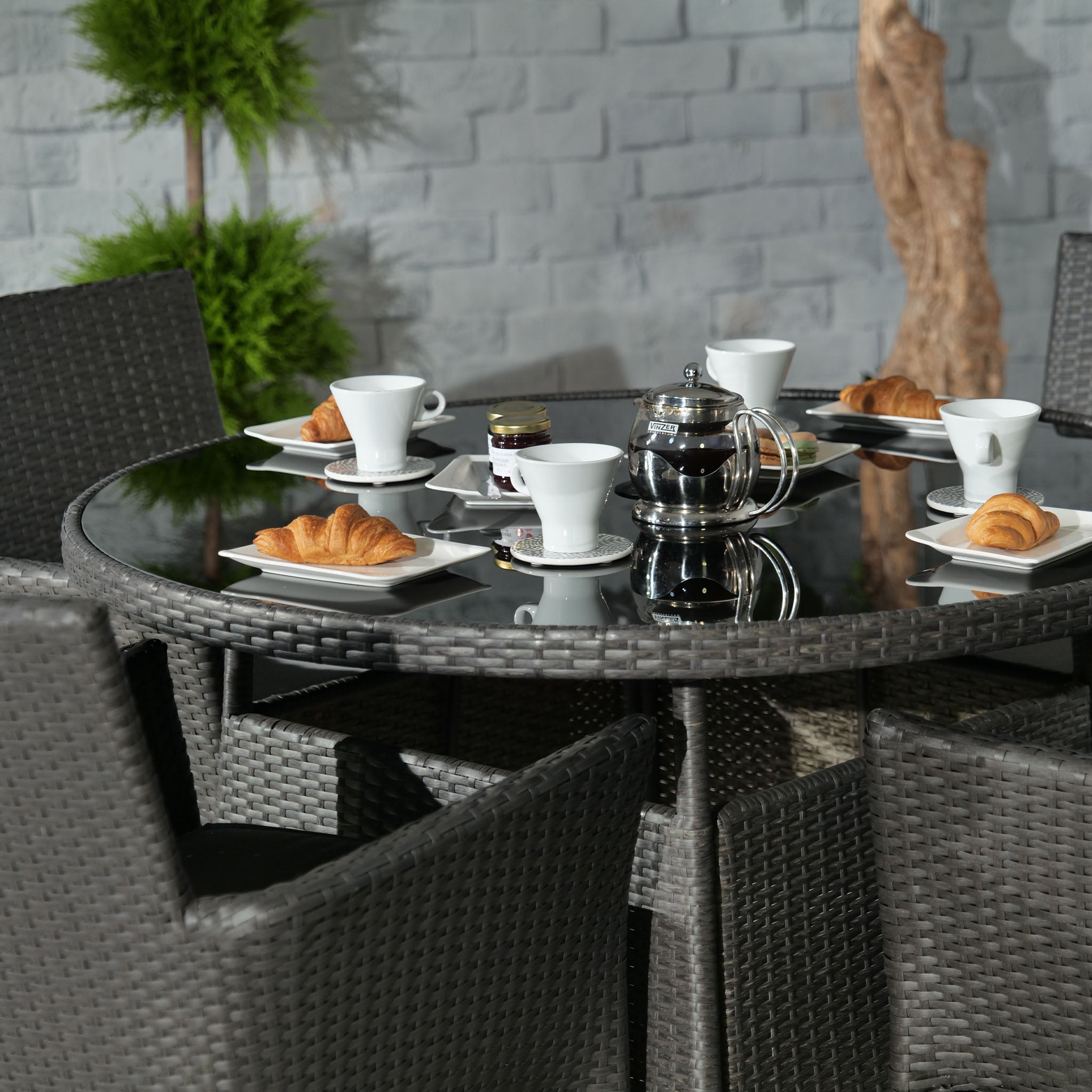 Rattan stacking store chairs and table