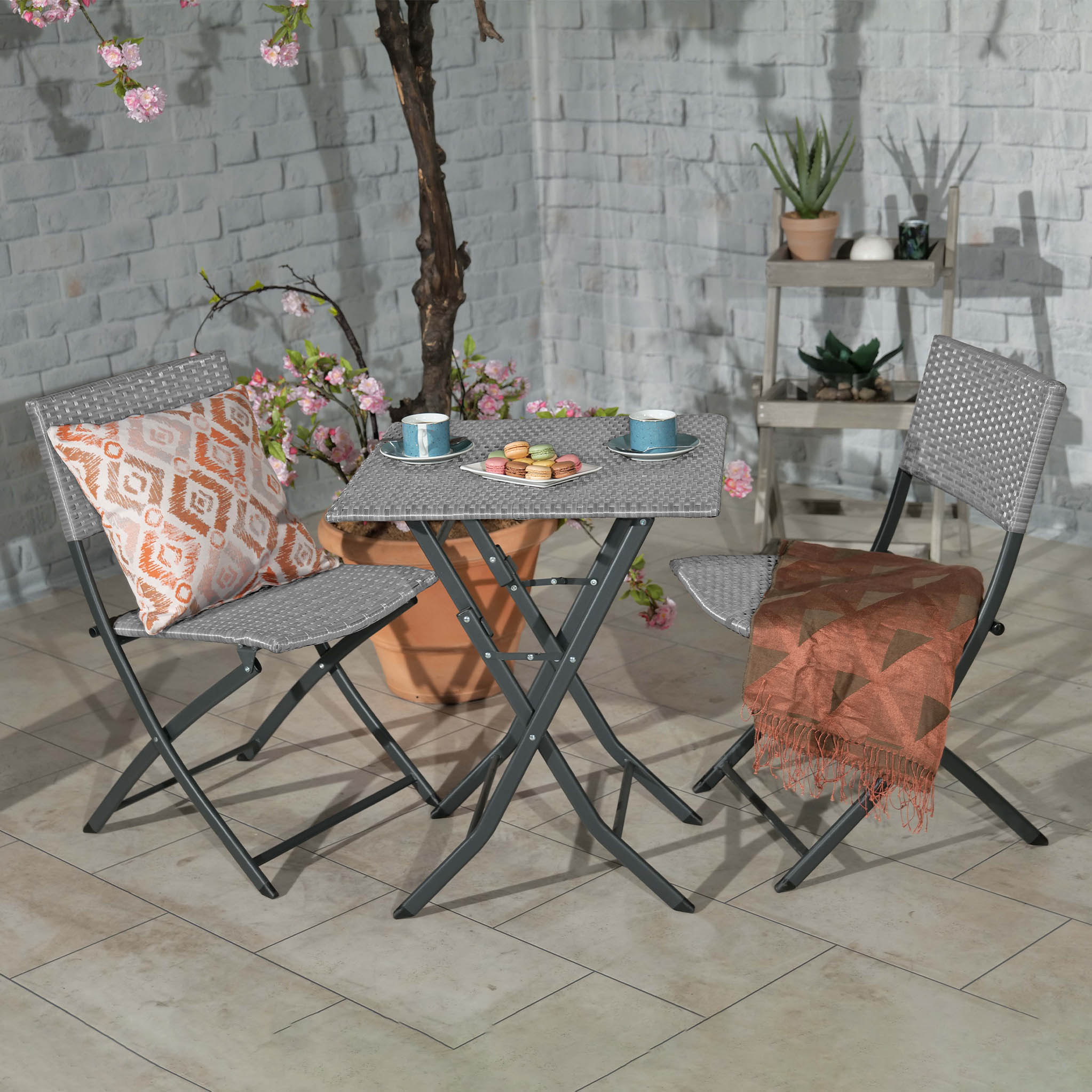 Rattan folding discount table and chairs