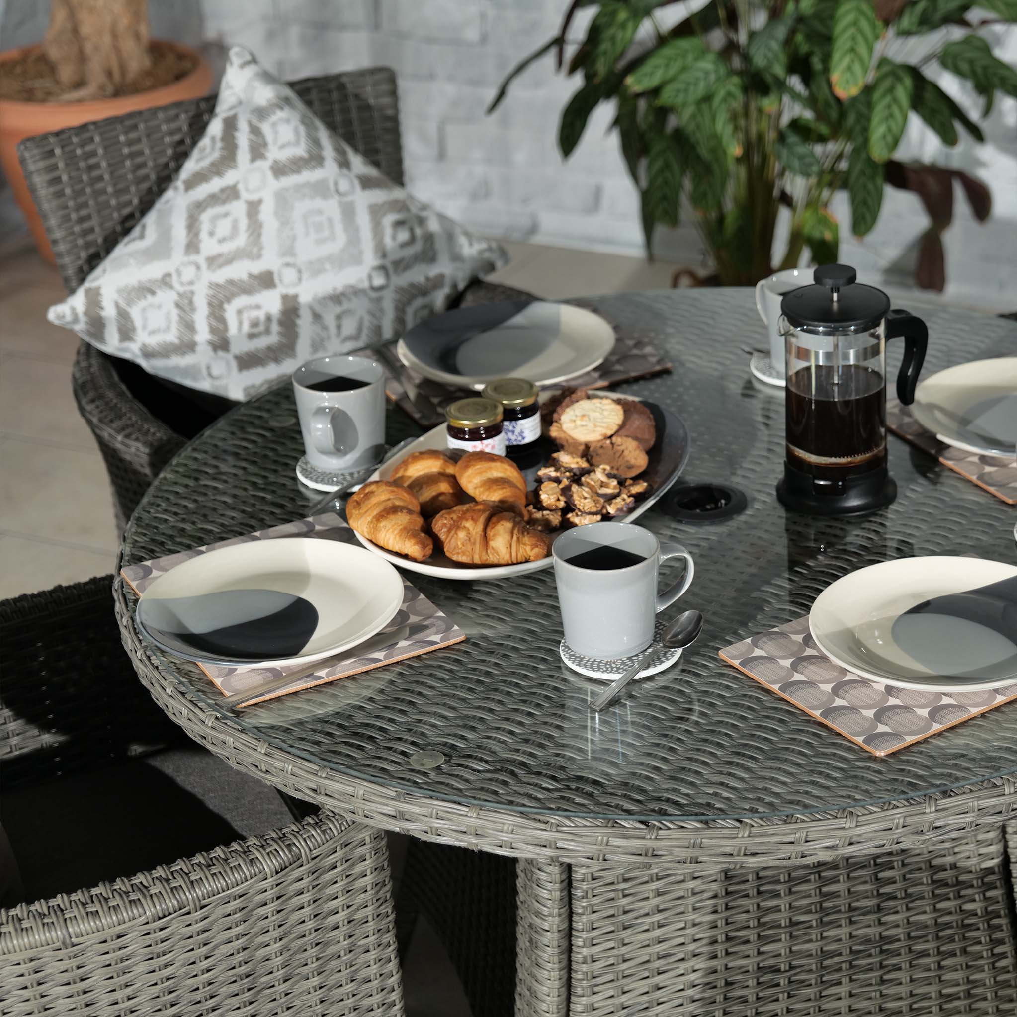 Round wicker deals dining set