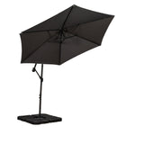 A black patio umbrella is open, showcasing its octagonal shape, mounted on an adjustable metal pole with a heavy square base, against a white background.