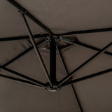 An open, dark fabric umbrella from an underneath perspective, showing its metal framework against a solid background.