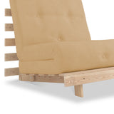 A beige lounging chair with a cushioned seat and backrest, featuring wooden armrests and legs, isolated against a white background.