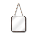 A square mirror with a weathered wood frame hangs by a braided rope against a white background.