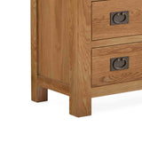 Zelah Oak 5 Drawer Chest of Drawers - Feet on drawers