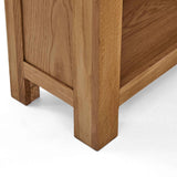 Zelah Oak Small Bookcase - Close up of feet of bookcase