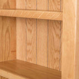 close up of Surrey Oak Slim Bookcase