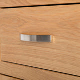 close up of contemporary metal handle on the London Oak Mini Sideboard by Roseland Furniture. 