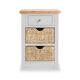 A small wooden storage unit with a gray drawer and two woven baskets, set against a white background.