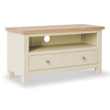 A cream-colored wooden coffee table with a natural wood top, featuring two drawers and a shelf, isolated against a white background.