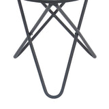 A black bar stool stands against a white background, with its slender legs crossed for stability.