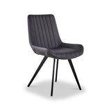 A gray upholstered chair with vertical stitching and four black metal legs stands centered against a white background.