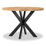 A round wooden table with black, intersecting, X-shaped metal legs, presented on a white background for emphasis.