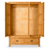 An open wooden armoire with empty shelves and two drawers below, isolated on a white background.