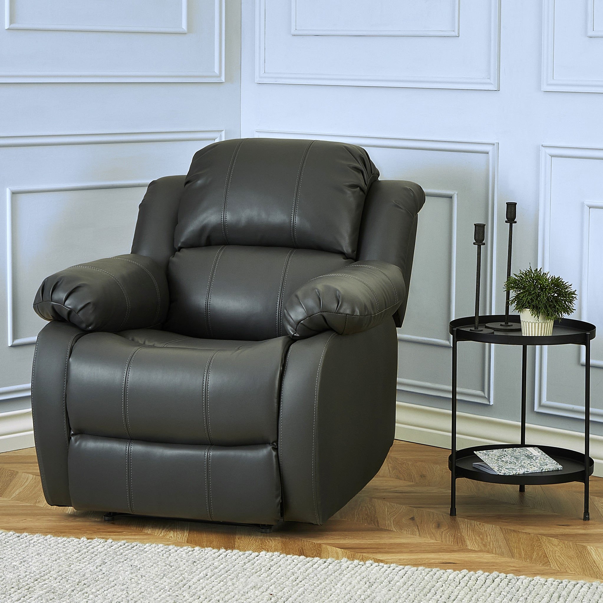 Anton bonded leather store reclining leather armchair