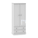 A white wardrobe with two doors above and two drawers below, standing against a plain background. The doors have round knobs, and the drawers have pull handles.