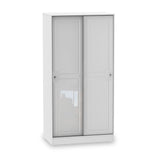 A white double-door cabinet stands isolated against a white background, displaying reflective glass panels on the upper half of each door.