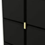 A sleek black door with a minimalistic gold handle, closed and framed by a white edge. The door appears modern, accentuated by clean lines and a matte finish.