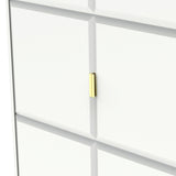 A white bookshelf with a golden knob, set against a plain background.