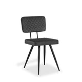 A black chair with a quilted design stands isolated against a white background.