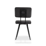 A modern black chair with a square upholstered backrest and quilted seat, supported by four angled metal legs, stands isolated against a white background.