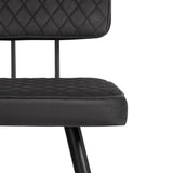 A modern black chair with a quilted backrest and cushion, supported by a sleek metal frame, isolated against a white background.