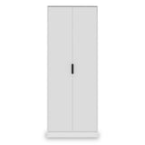 A white two-door wardrobe stands closed against a plain backdrop, with simple black handles on one door.