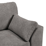 A grey fabric sofa with a cushion rests against an armrest, set against a white background.