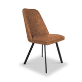 A brown upholstered dining chair with vertical stitching on the backrest stands on black metal legs against a white background.