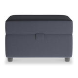 A dark gray, fabric-upholstered storage ottoman with a lift-off lid and short wooden legs against a white background.